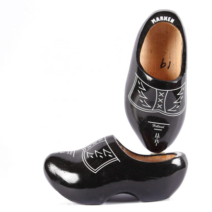 black wooden shoes